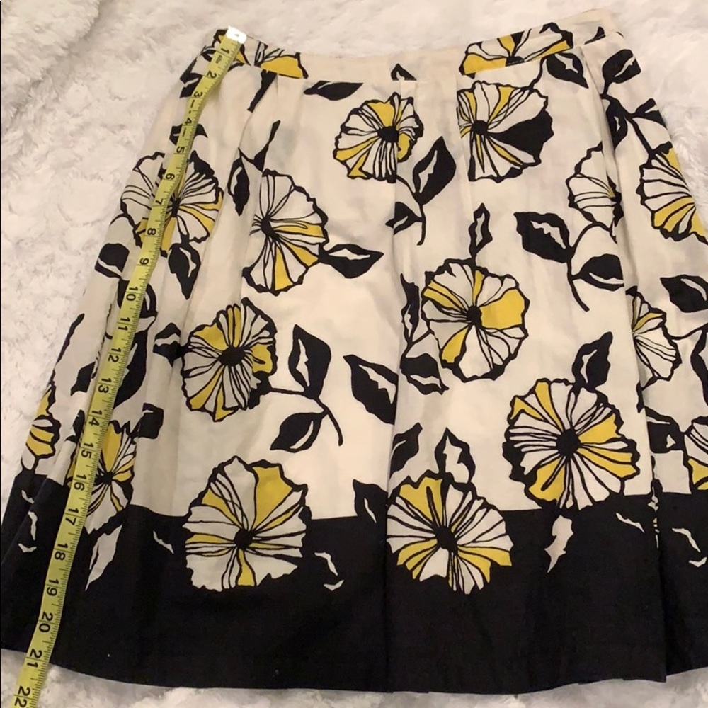 White, yellow and black skirt